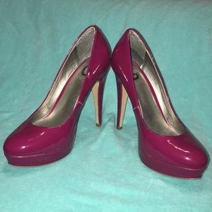 Fuchsia patent pumps